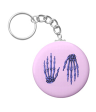 Keychains with designs based on bones of the human body.