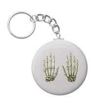 Keychains with designs based on bones of the human body.