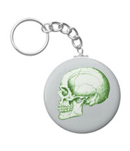 Details of the human skull singularly and in groups, in various colors and arrangements. Keyrings / keychains