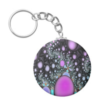 Keychains with digital art designs.