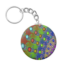 Keychains with digital art designs.