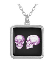 Details of the human skull singularly and in groups, in various colors and arrangements. pendants