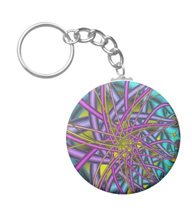 Keychains with digital art designs.